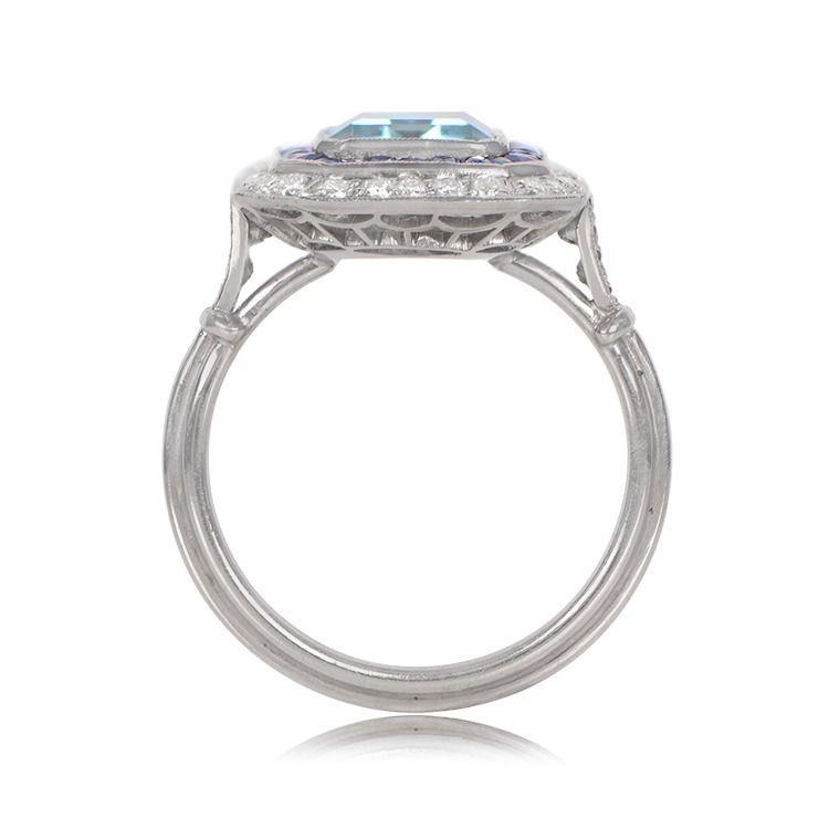 Platinum Cushion Cut Diamond and Sapphire Halo set Ring