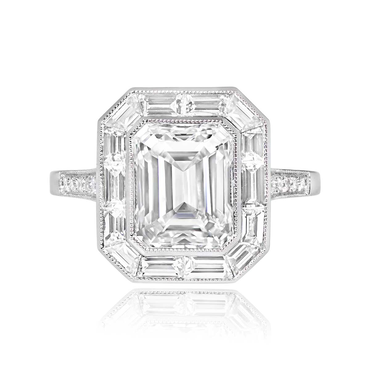 Platinum Cushion Cut Diamond and Sapphire Halo set Ring