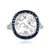 Platinum Cushion Cut Diamond and Sapphire Halo set Ring