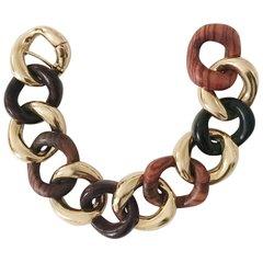 Elegant Alternating Yellow Gold Twist and White Jade Link Bracelet