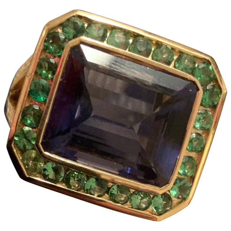 Rose Gold Bezel Set Dark Blue Topaz with Surrounding Pink Sapphire Ring