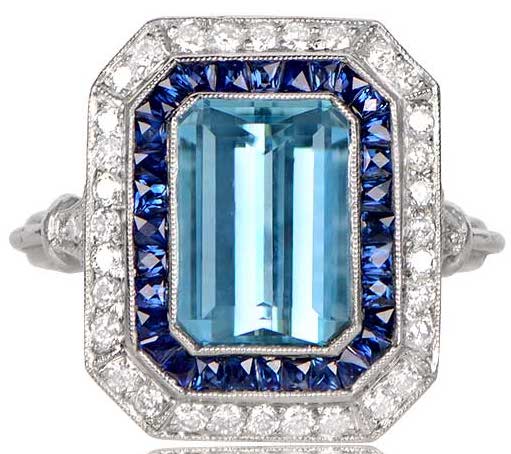 Platinum Cushion Cut Diamond and Sapphire Halo set Ring