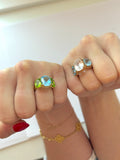 Mini Blue Topaz and Peridot Three Stone Ring with Rope Twist Border