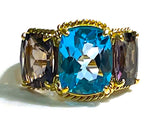 Blue Topaz and Iolite Three Stone Ring with Rope Twist Border