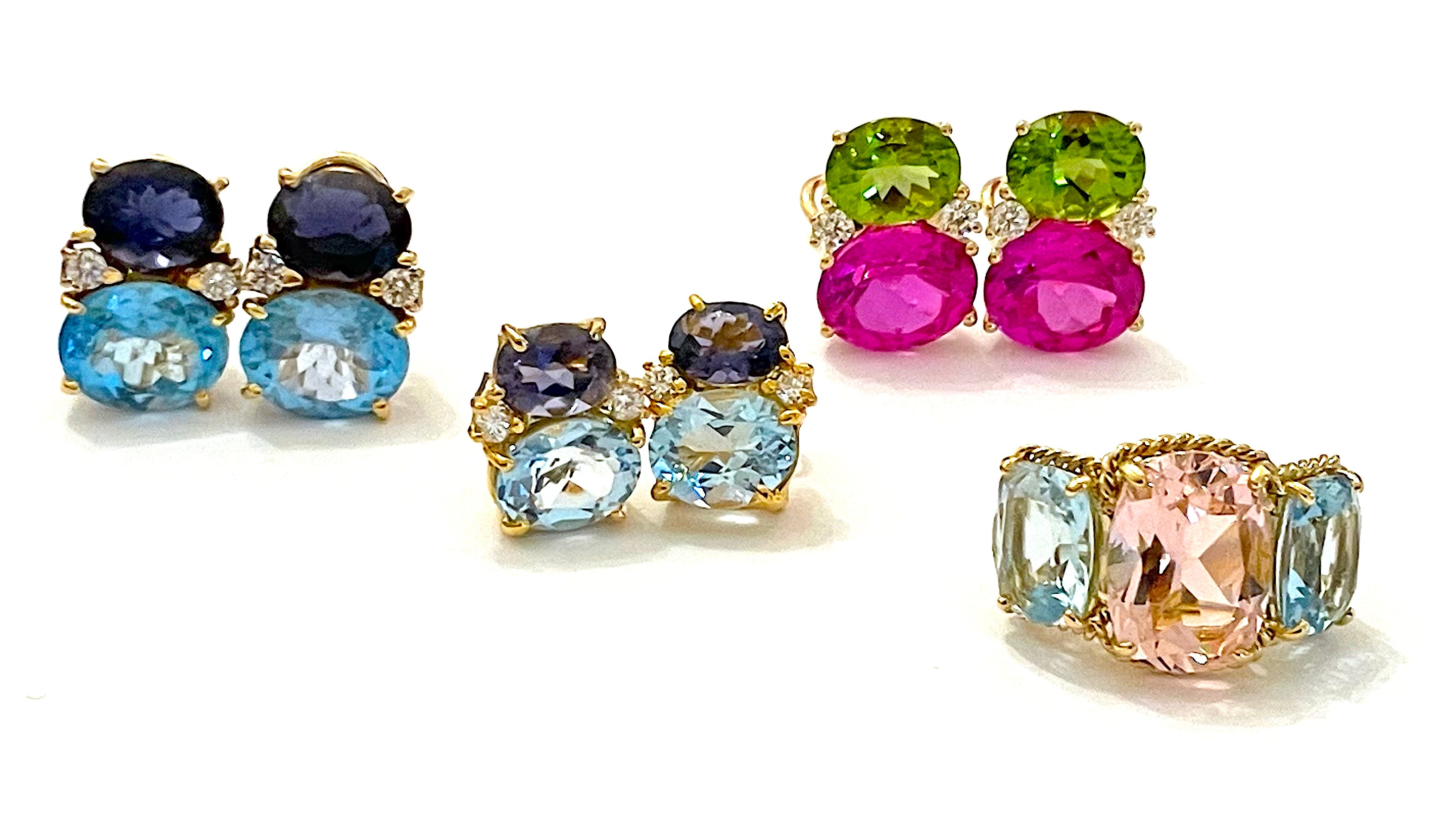 18kt Yellow Gold Three Stone Ring with Pink Topaz and Blue Topaz and Rope Twist Border