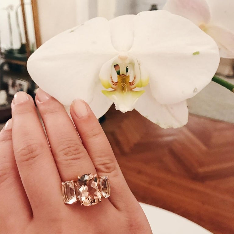 18kt Yellow Gold Three Stone Ring with Pink Topaz and Blue Topaz and Rope Twist Border
