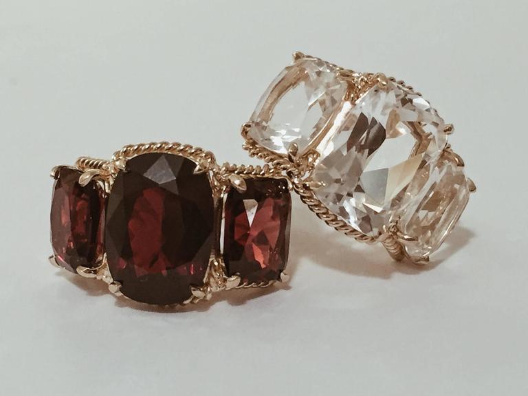 18kt Yellow Gold Three Stone Ring with Pink Topaz and Blue Topaz and Rope Twist Border