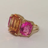 18kt Yellow Gold Three Stone Ring with Pink Topaz and Blue Topaz and Rope Twist Border